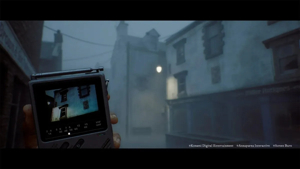 Simon uses the CRTV while looking down a foggy St. Amelia street in Silent Hill Townfall